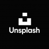 UNSPLASH LOGO BLACK BACKGROUND