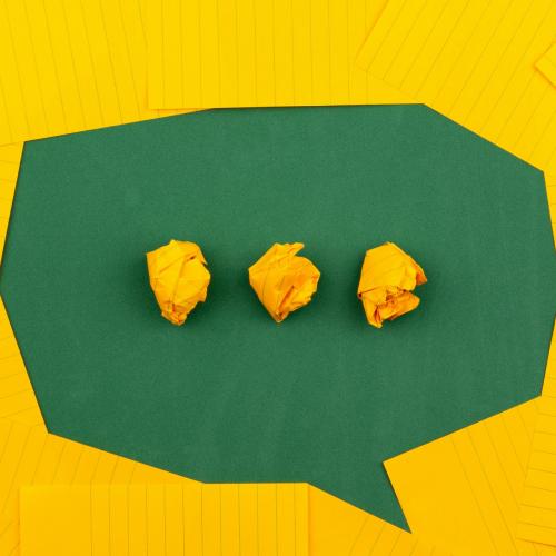Green and yellow discussion icon